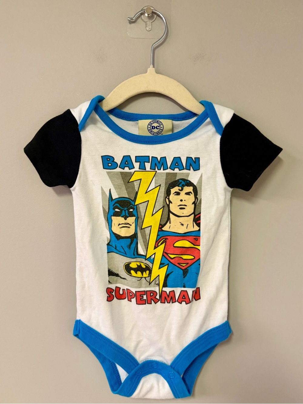 DC Comics Baby Onesie with Batman & Superman Design